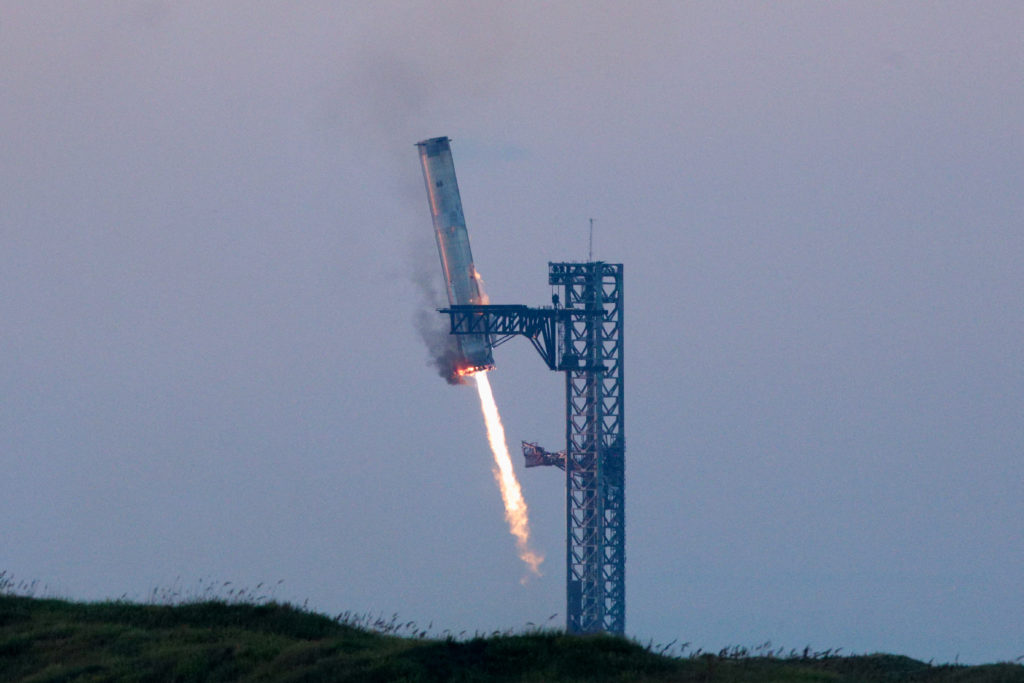 SpaceX successfully captures a returning Starship booster.